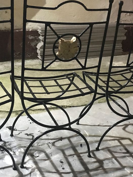 Scaune de grădina din fier forjat .