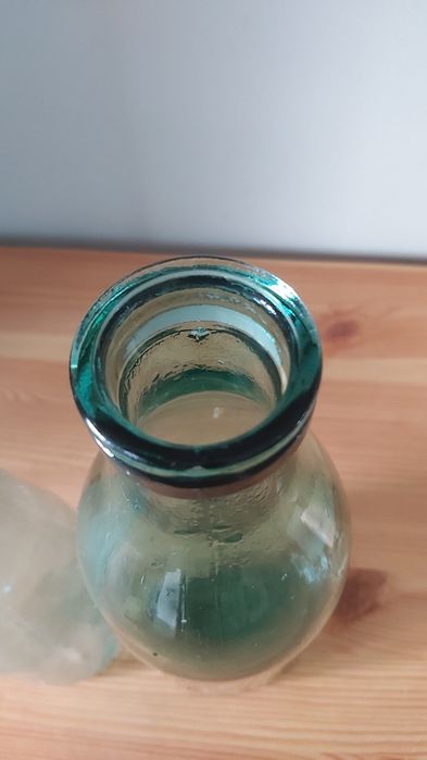 Бутылки молочные