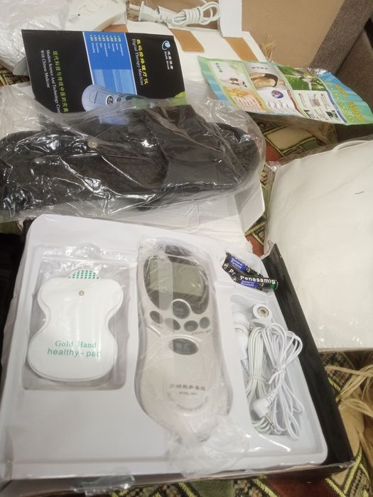 Массажёр для ног с электроподогревом.