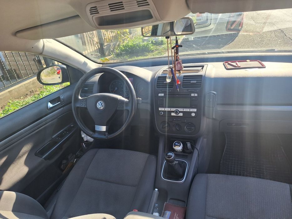 Volkswagen Golf 2009 benzină, 1.408 € — imagine 2
