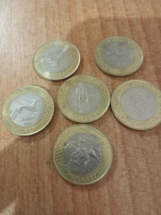 Монеты "Семь сокровищ  казаха"