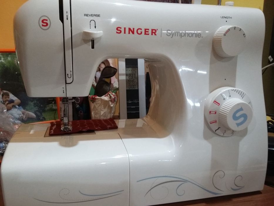 Masini de cusut Singer