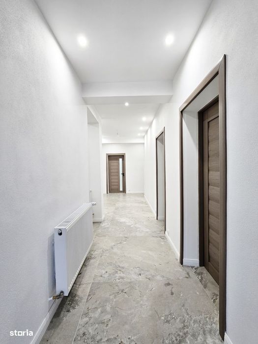 Casă pe un nivel cu 4 camere și teren de 515 mp