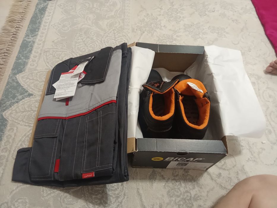 Спецодежда  продаем новый