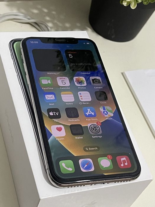 iPhone X , 64GB.