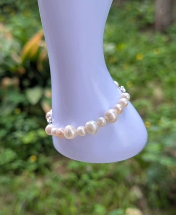 Veche bratara cu perle naturale de cultura, cu un pandantiv cu un sarpe din argint de 925