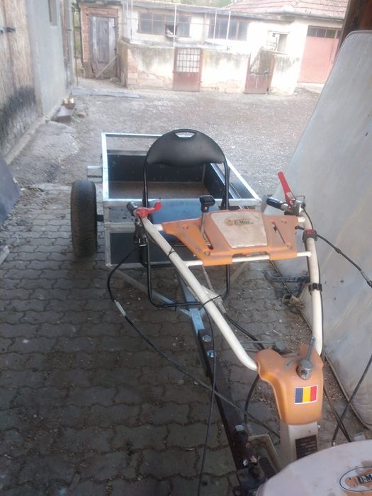 Vând remorcuță de motocultot toată completă numa de pus pe motocultor stopuri bucșă să nu să răstoarne.etc