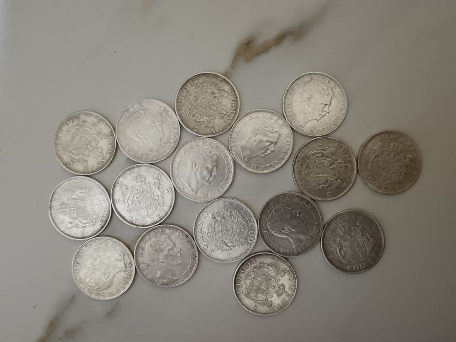 19 monede de argint. 1400 lei