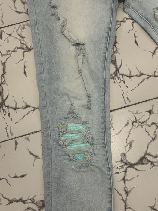 Blugi slim fit ripped