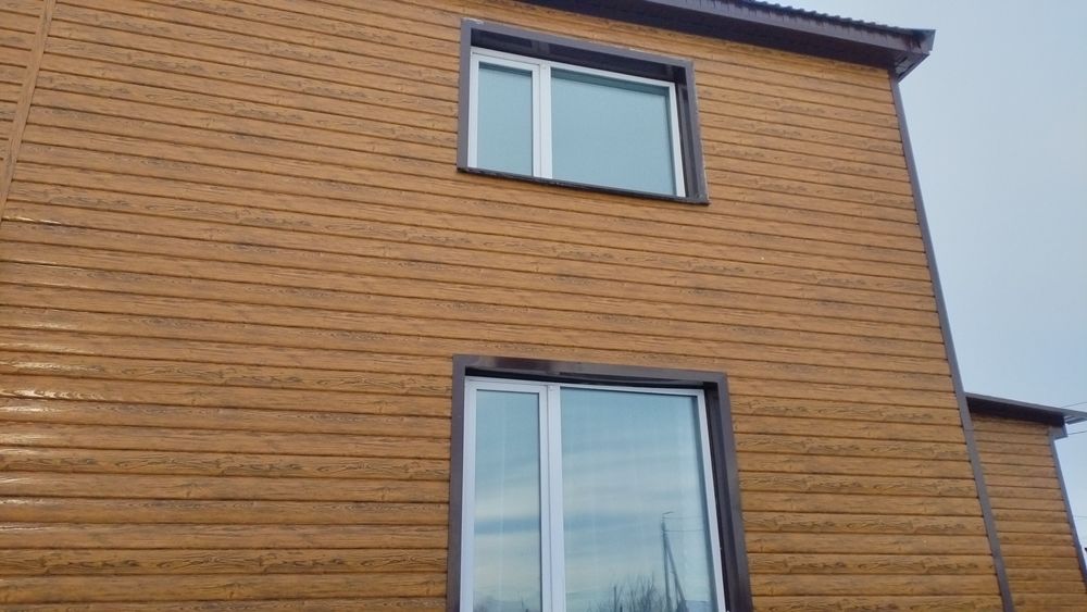 Обшивка фасада сайдингом, профлистом