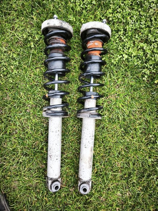 Set 2 amortizoare/telescoape spate BMW E60+arcuri+flanse