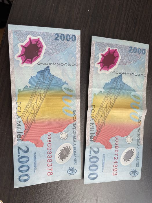 Vand 2 bacnote 2000 lei cu exhilipsa
