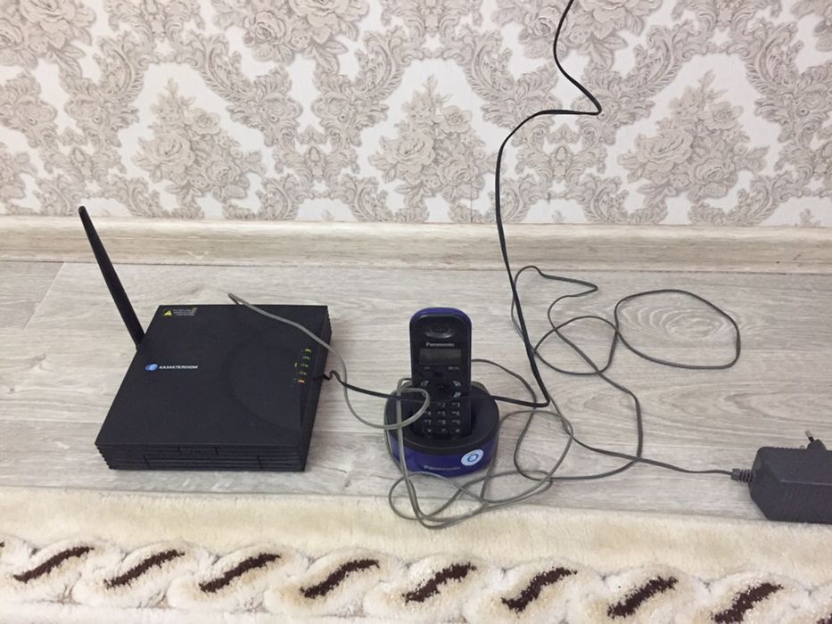 Стационарный телефон и беспроводный терминал