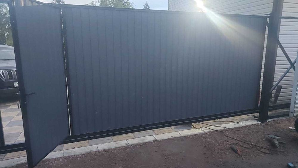 Ворота откатные  заборы навесы