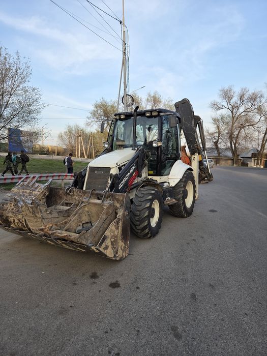 экскаватор погрузчик 3 в 1