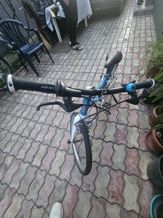 Bicicleta Woom 4 în stare perfecta