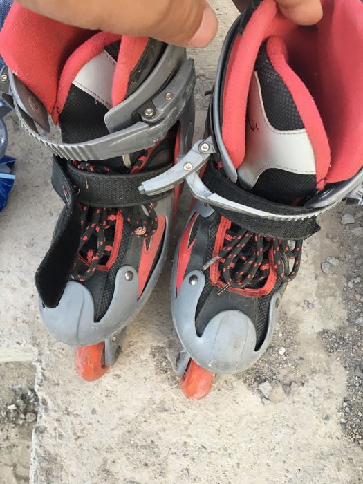 Роликовые коньки