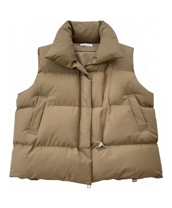 Новая жилетка продам