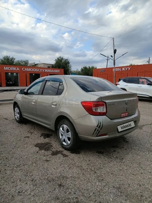 Рено логан 2. Renault Logan 2 2014 газ бензин.