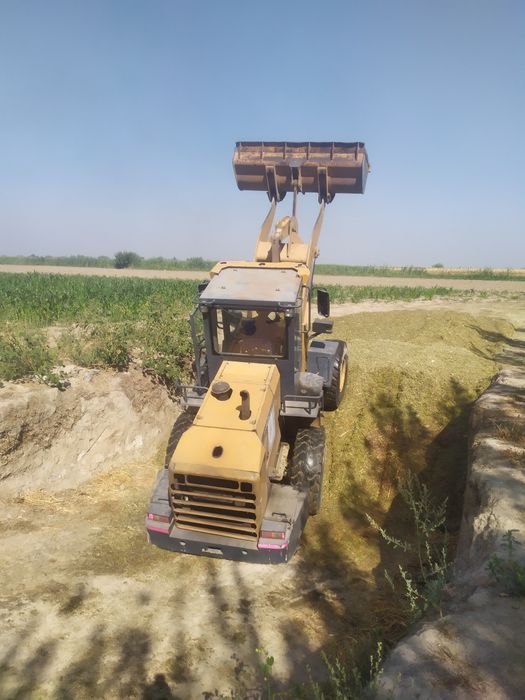 Фронтальный погрузчик Long