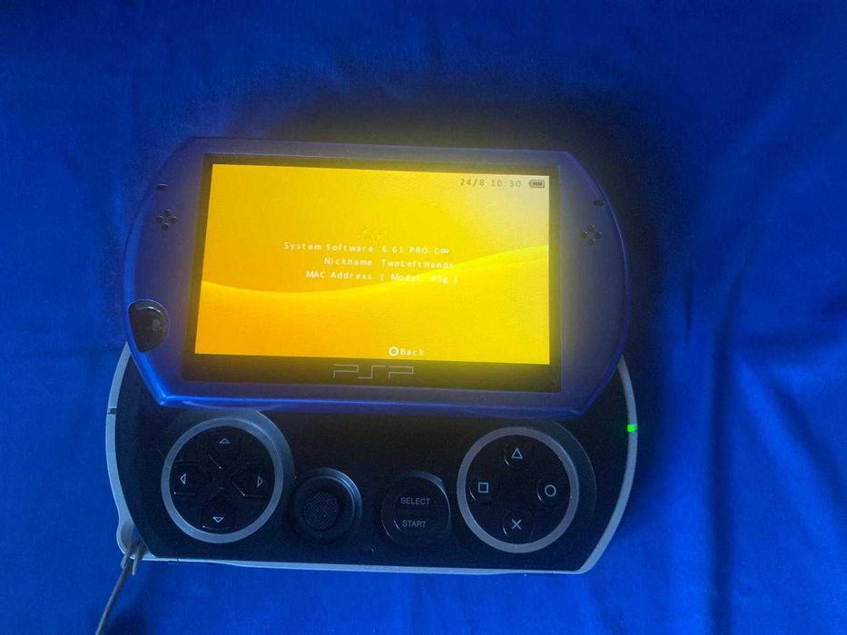 PSP GO impecabil MODAT cu zeci de jocuri