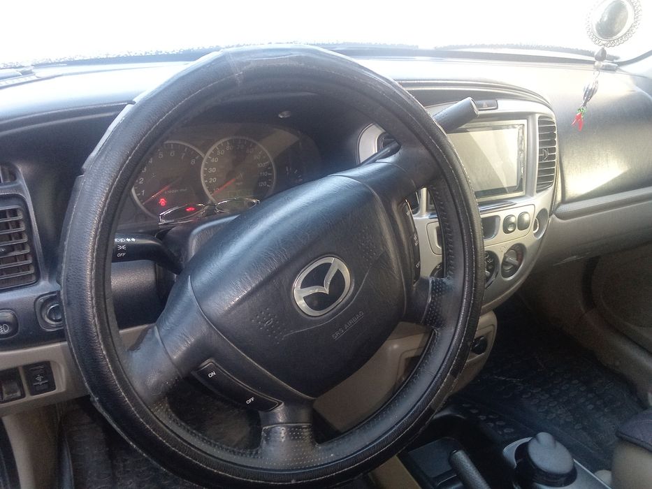 Продам срочно Mazda Tribute