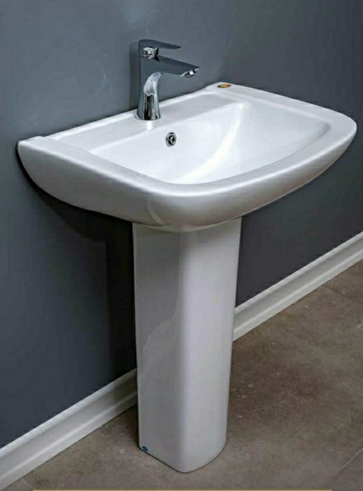 Раковина с ношкой 56 см