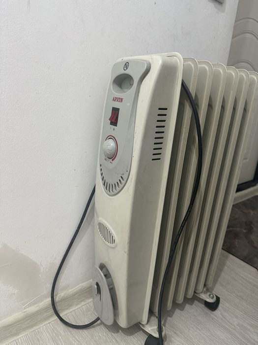 Масляный обогреватель