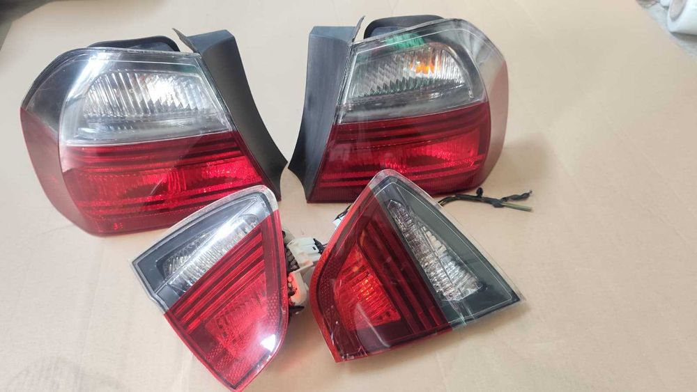 Stopuri/ triple BMW Seria 3 E90 sedan stil Blackline aftermarket