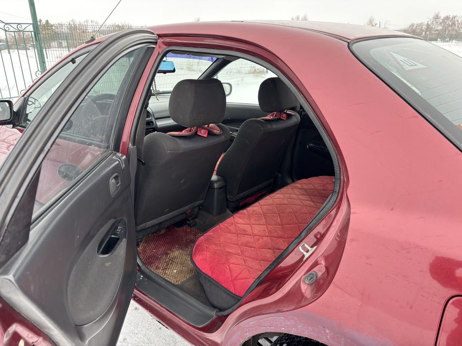 мазда 323 ba владеет женщина