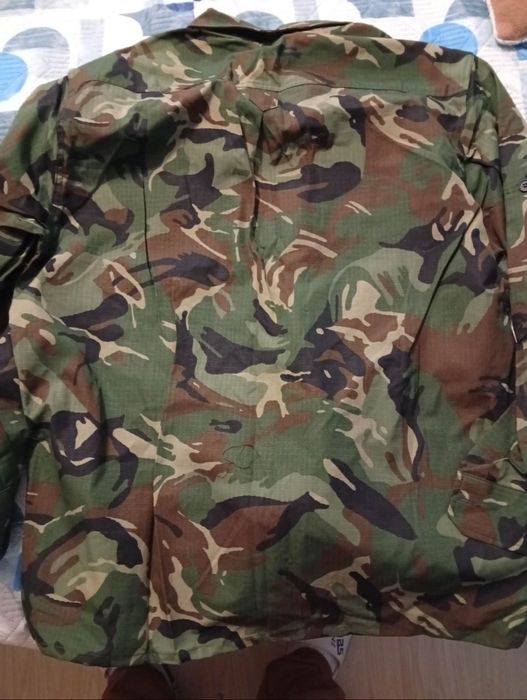 Камуфлажни дрехи