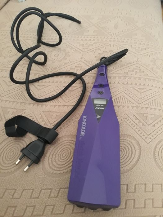 Vand perie de par electrica .