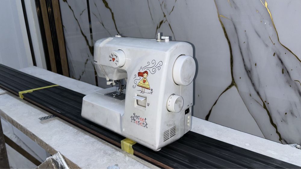 Швейная машина