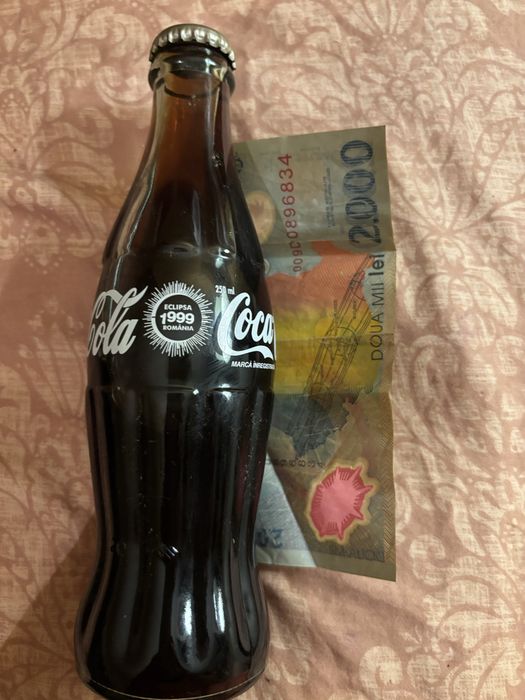 Sticla colectie Coca Cola  editie limitata 1999 eclipsa si bacnota eclipsa