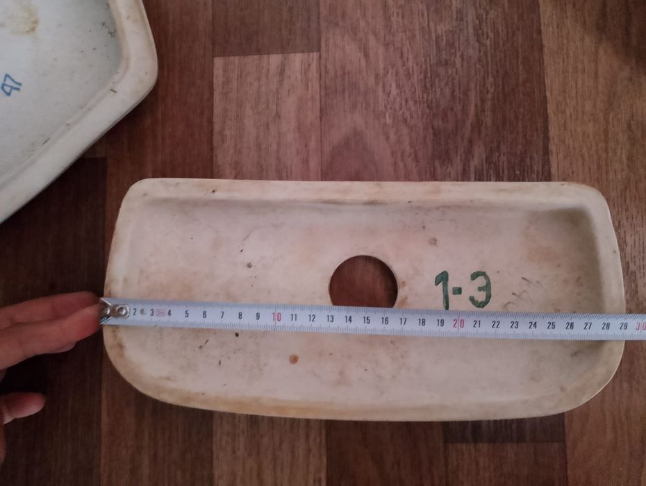 Крышка от бочка унитаза