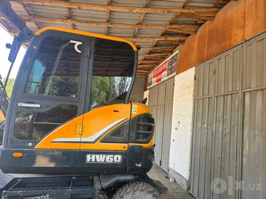Hyundai HW60 g'ildirakli ekskavator (2017 yil, 360° rotator bilan)