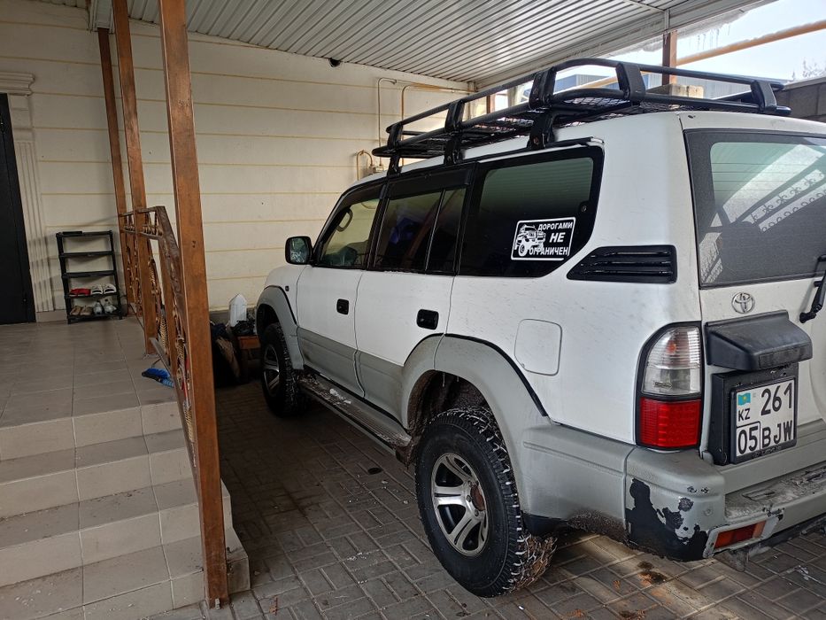 Тойота лэнд крузер прада J90