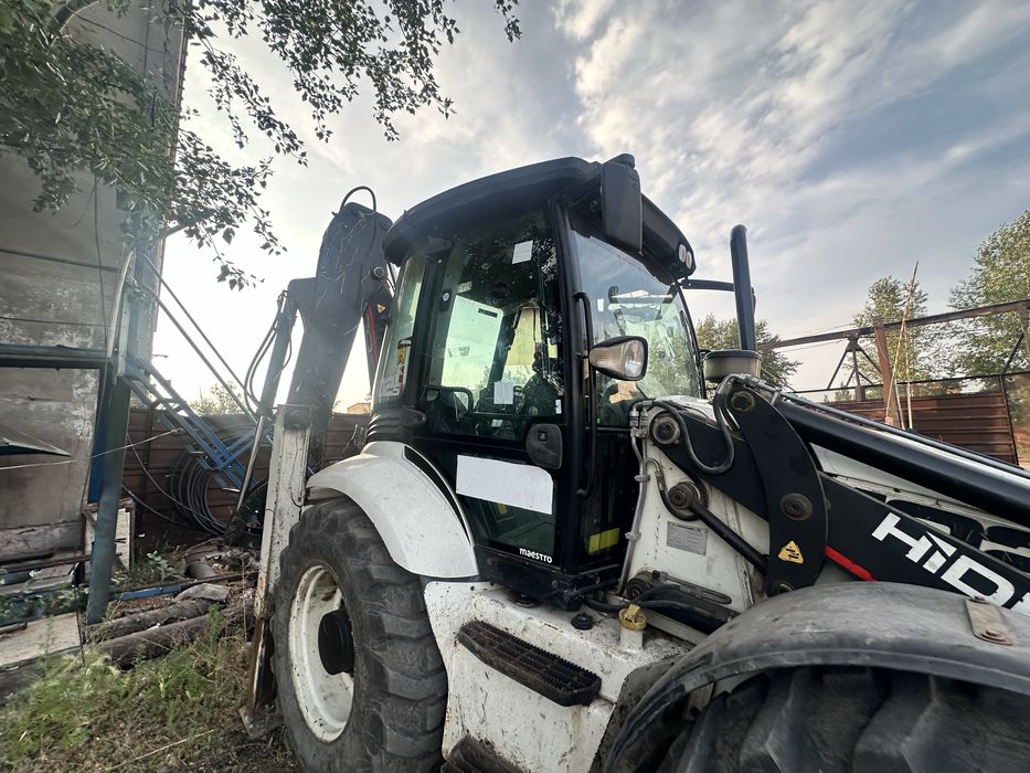 Экскаватор-пргрузчик продам