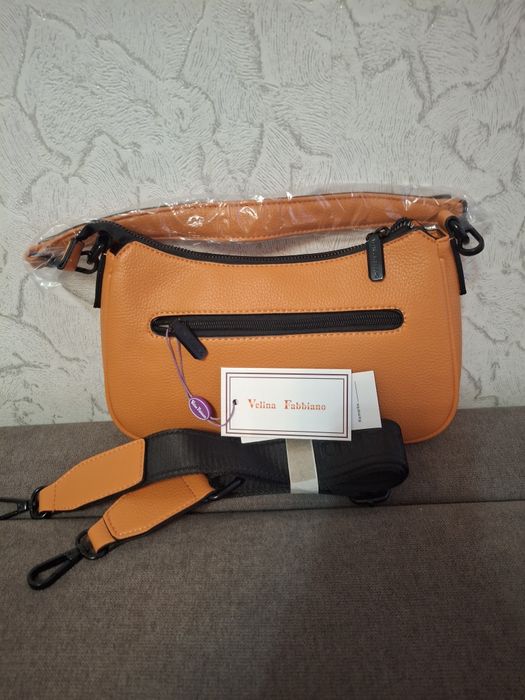 Модная,   новая.