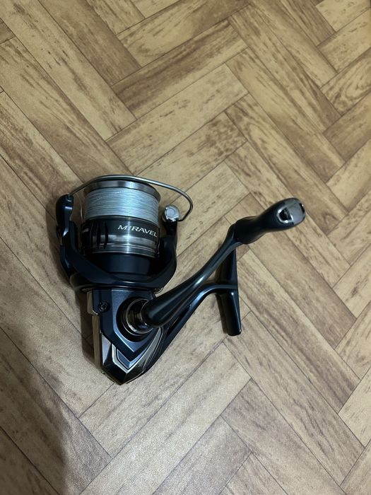 Продам катушку и спиннинг