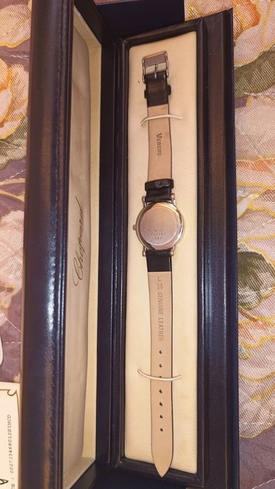Часы фирмы chopard, белое золото 750