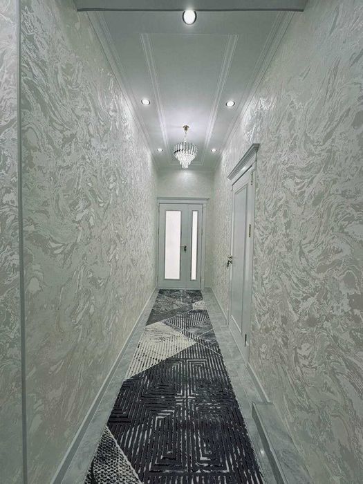 Мархабо худудида жойлашган 3 хонали квартира мансард жойлашган