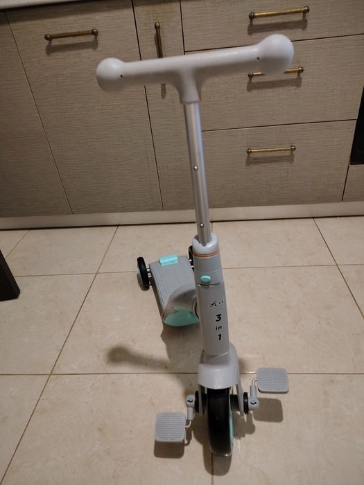 Trotinetă 3 in 1  aproape noua.