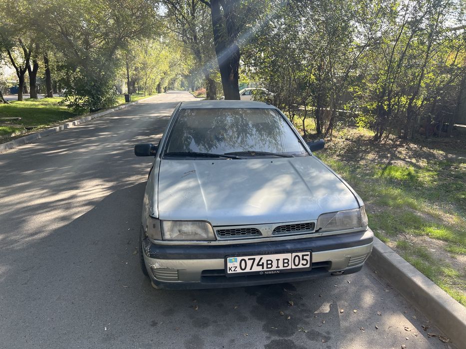 Машина ниссан сани