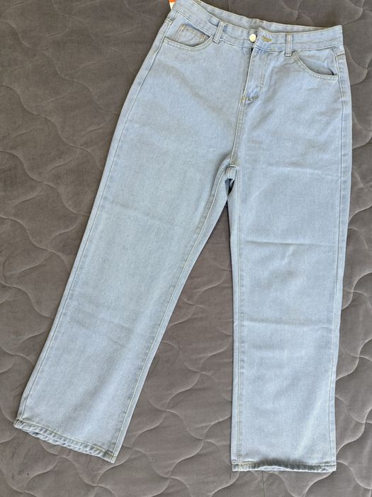 Джинсы новые