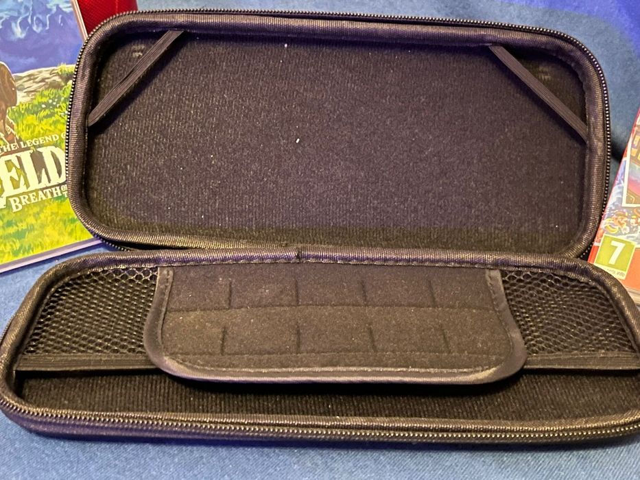 Nintendo switch + 12 jocuri incluse Zelda Mario, accesorii