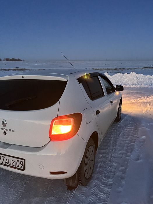 Рено сандеро 2015 г