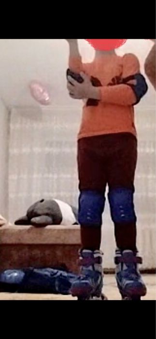 Роликовые коньки