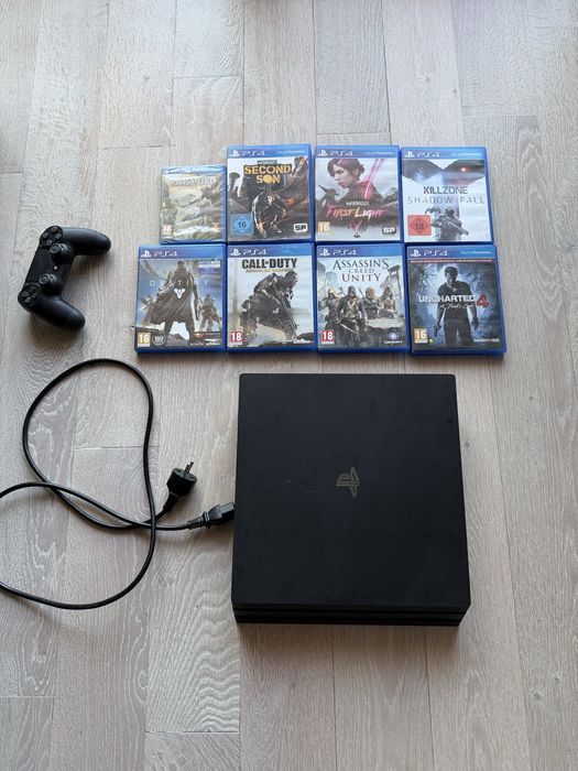 PS4 Pro + 2  controlere + jocuri