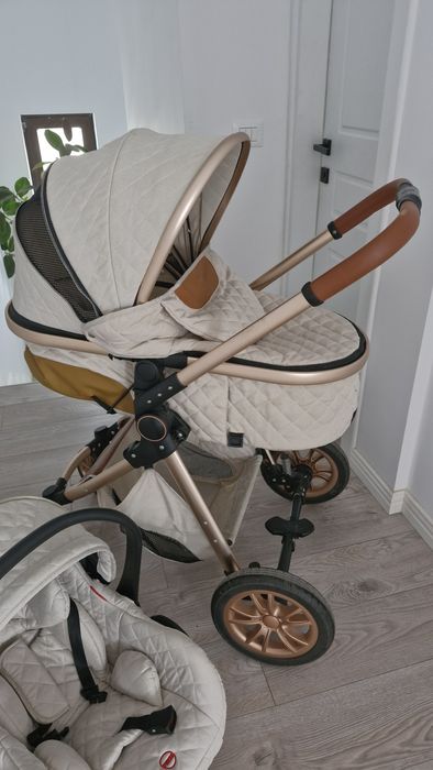 Vând cărucior 3 in 1  aproape nou